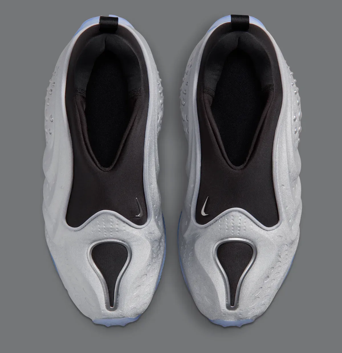 Nike First Sight Shadow “Metallic Silver” 7月24日发售,液态金属质感重新诠释Foamposite未来主义插图3 Nike First Sight Shadow “Metallic Silver” 7月24日发售,液态金属质感重新诠释Foamposite未来主义