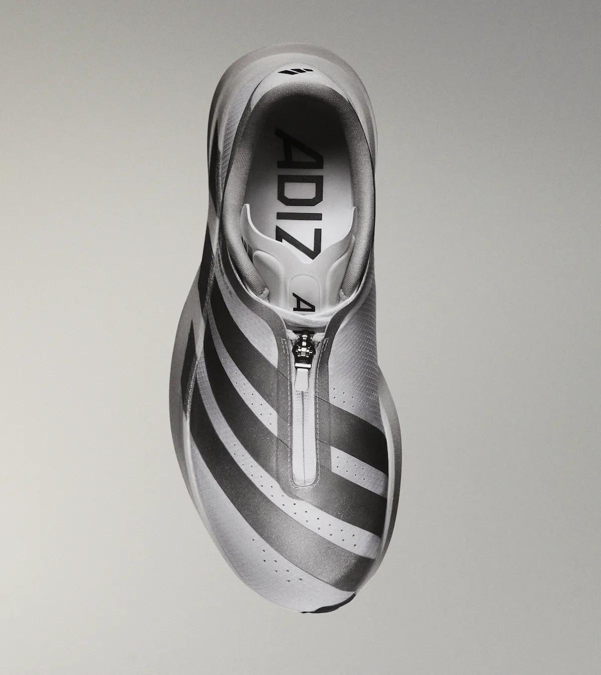 adidas Adizero Evo SL Zip黑白配色七月六日发售，拉链覆面与Lightstrike Pro中底致敬千禧田径钉鞋