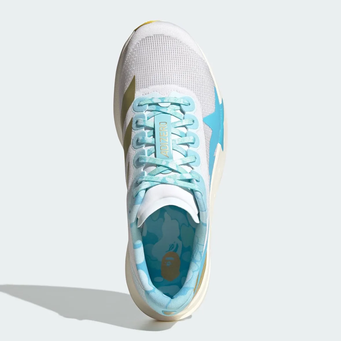 BAPE x adidas Adizero EVO SL 联名跑鞋官图释出,不对称粉蓝鸳鸯配色迷彩细节流星Logo替代三条纹金色点缀马牌橡胶外底6月发售插图4 BAPE x adidas Adizero EVO SL 联名跑鞋官图释出,不对称粉蓝鸳鸯配色迷彩细节流星Logo替代三条纹金色点缀马牌橡胶外底6月发售